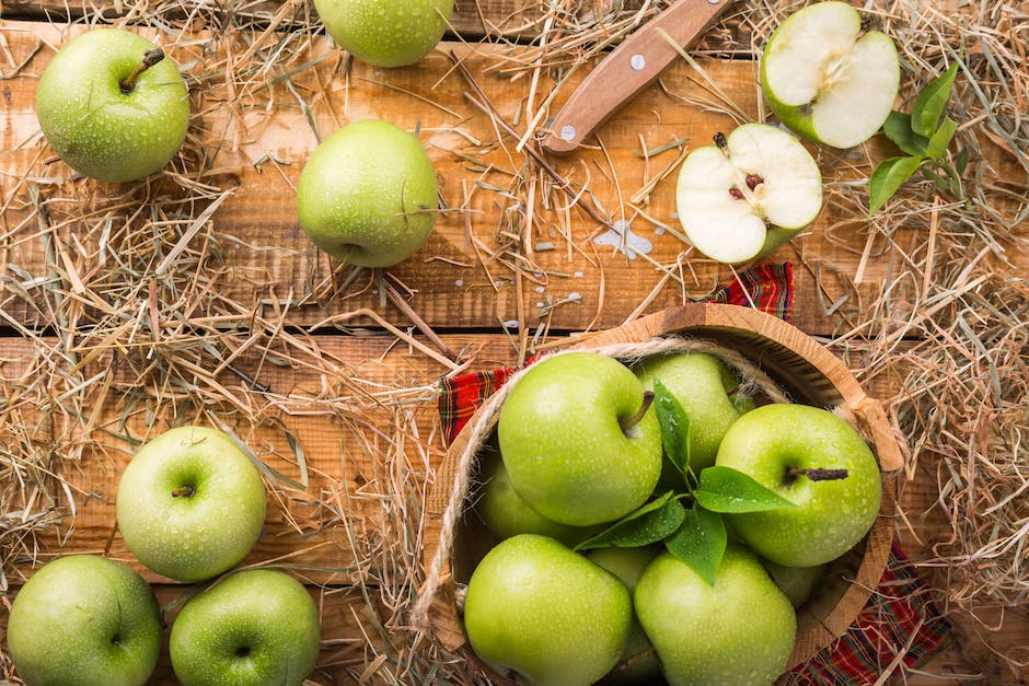 Assortment of pink-fleshed apples, showcasing their vibrant colors and unique flavors