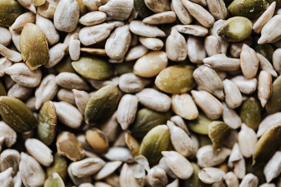 Image of pumpkin seeds being harvested and preserved, showing the step-by-step process.